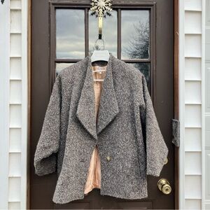 Vintage Italian woman’s sweater in a shawl style.